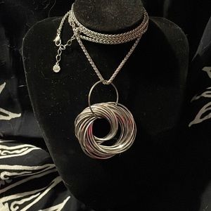 Vintage 2010 Fifth Avenue Collection Long Silvertone Necklace w Swirled Rings